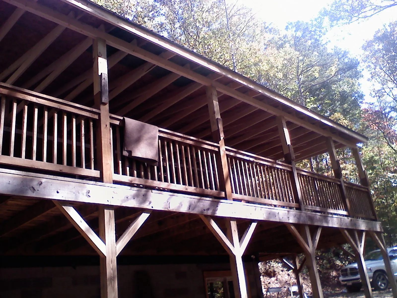 Timber framing under a new elevated porch and deck — Roof Leak Repair in Wayland by Roofing Brothers